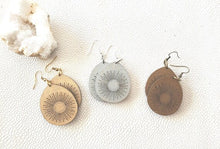 Load image into Gallery viewer, Metallic wood sunburst earrings in silver finish