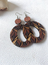 Load image into Gallery viewer, Leaf Hoops boho wood earrings in earthy brown and burgundy leaf patterns
