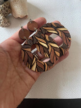 Load image into Gallery viewer, Leaf Hoops wood earrings in warm neutral hand-painted colors
